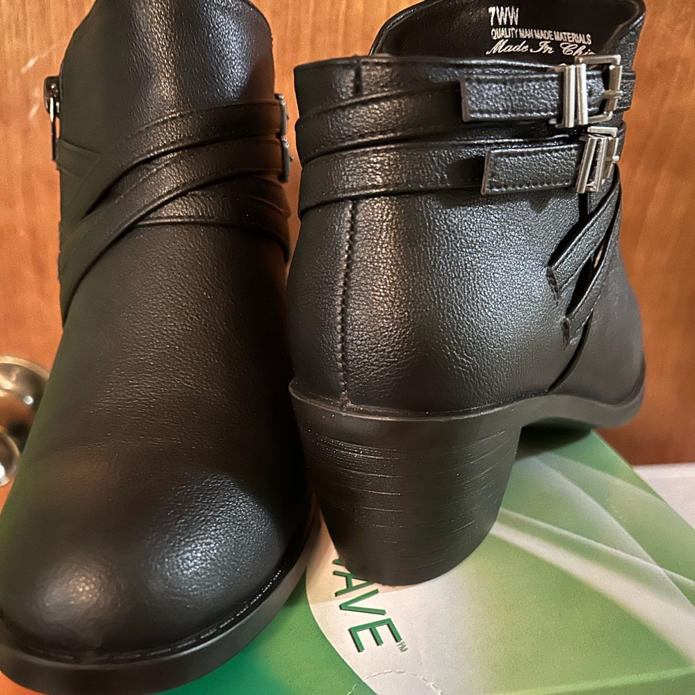Easy Street black booties. Heel is 2.14 inches. Great to dress up or down.